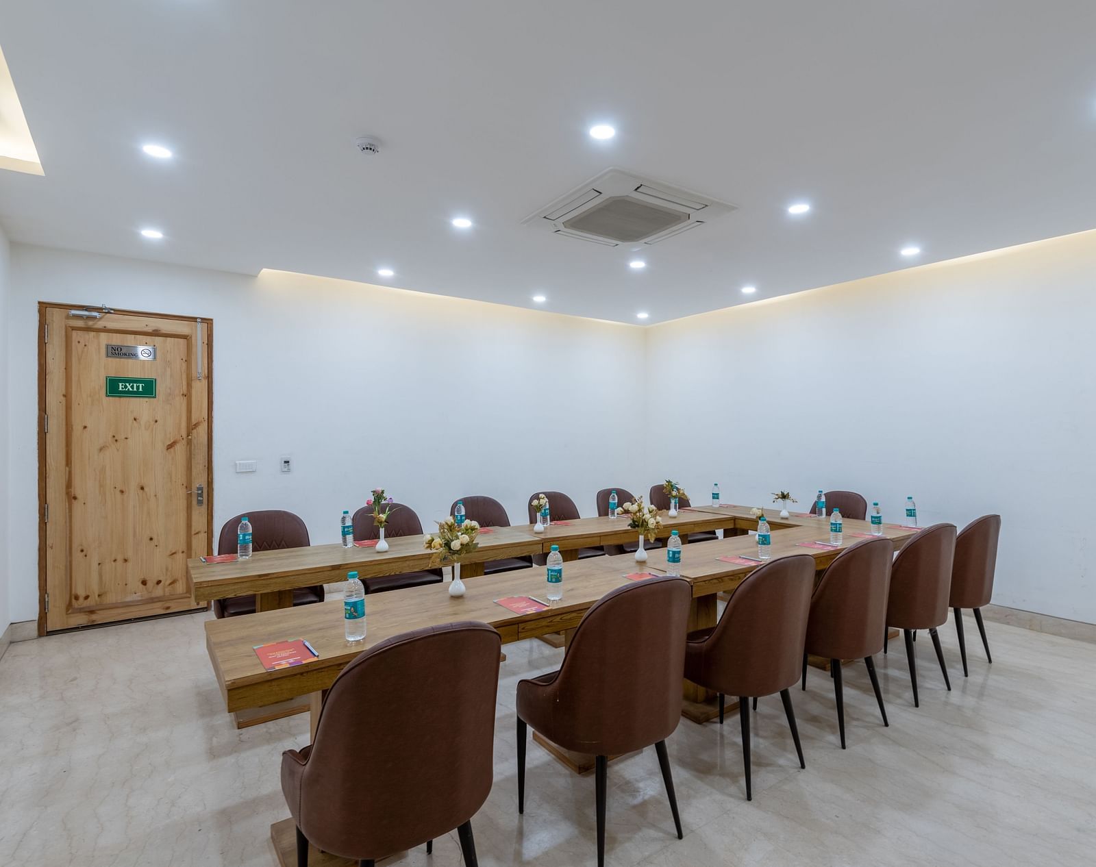 Spacious conference room with multiple chairs arranged for a meeting or event at DLS The Classio